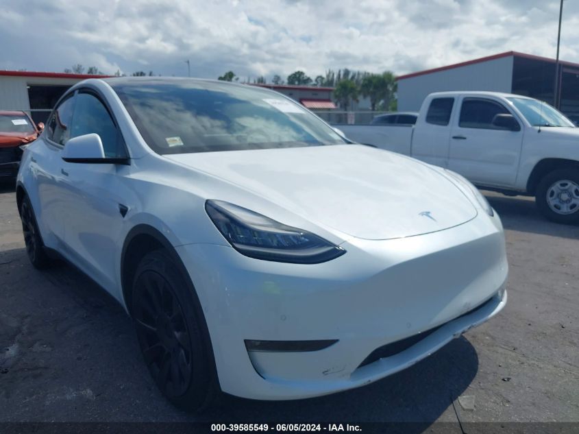 2021 Tesla Model Y Standard Range Rear-Wheel Drive VIN: 5YJYGDED0MF105730 Lot: 39585549