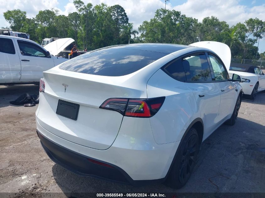 2021 Tesla Model Y Standard Range Rear-Wheel Drive VIN: 5YJYGDED0MF105730 Lot: 39585549