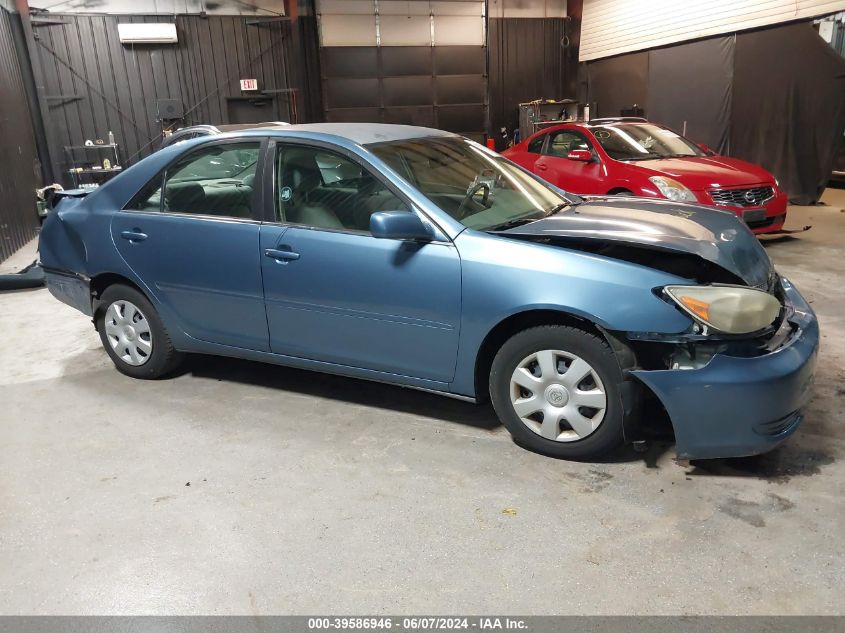 2003 Toyota Camry Le VIN: 4T1BE32K03U780410 Lot: 39586946