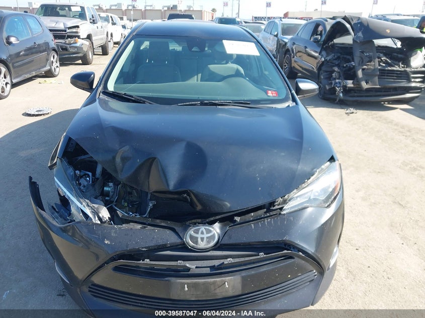 2017 Toyota Corolla Le VIN: 5YFBURHE1HP631259 Lot: 39587047