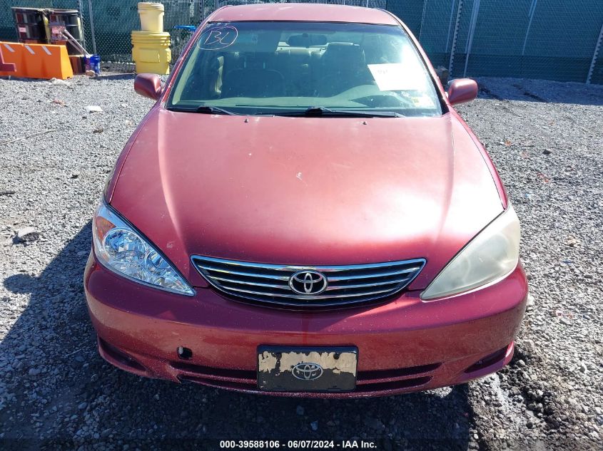 2002 Toyota Camry Le VIN: JTDBE32K320008302 Lot: 39588106