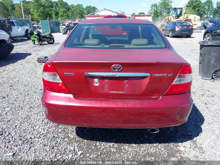 2002 Toyota Camry Le VIN: JTDBE32K320008302 Lot: 39588106