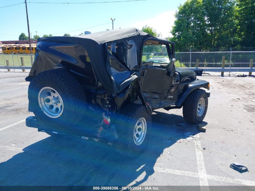 2000 Jeep Wrangler Sahara VIN: 1J4FA59SXYP743769 Lot: 39588356