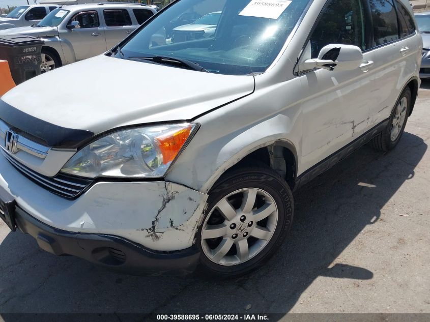 2007 Honda Cr-V Ex-L VIN: JHLRE38747C000154 Lot: 39588695