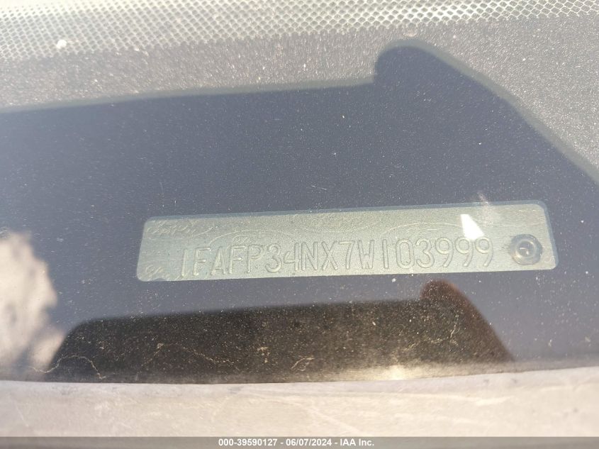 2007 Ford Focus S/Se/Ses VIN: 1FAFP34NX7W103999 Lot: 39590127