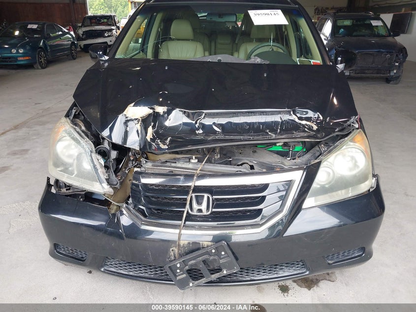 2008 Honda Odyssey Ex-L VIN: 5FNRL38778B017215 Lot: 39590145