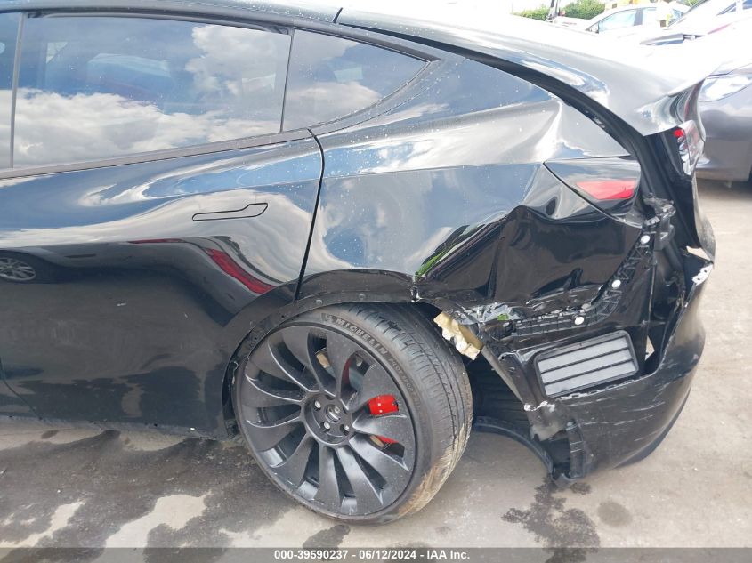 2023 Tesla Model Y Awd/Performance Dual Motor All-Wheel Drive VIN: 7SAYGDEF4PF774236 Lot: 39590237