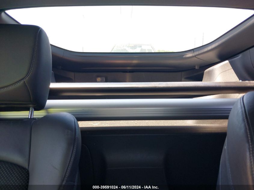 2009 Nissan 370Z Touring VIN: JN1AZ44E09M404819 Lot: 39591024