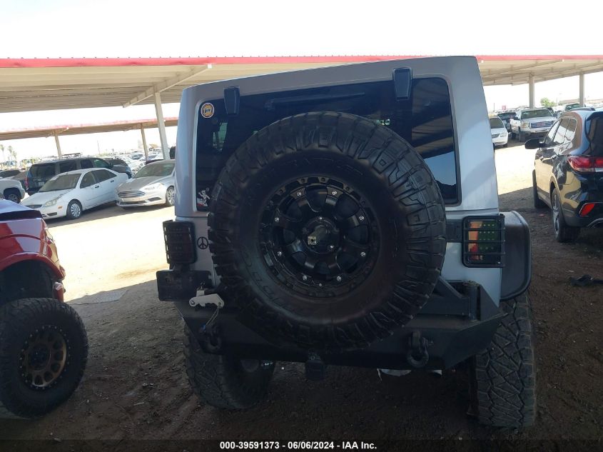 2014 Jeep Wrangler Unlimited Sahara VIN: 1C4BJWEG8EL186388 Lot: 39591373