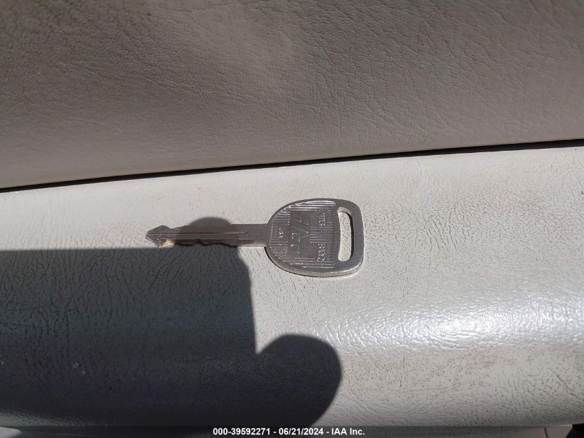 2003 Chevrolet Tahoe Lt VIN: 1GNEC13Z03J238630 Lot: 39592271