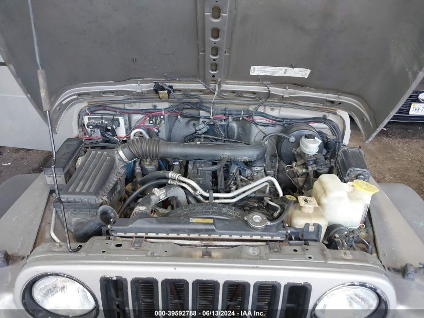 2000 Jeep Wrangler Sport VIN: 1J4FA49S4YP792704 Lot: 39592788