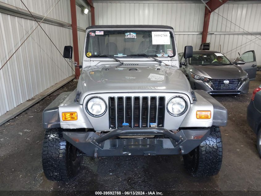 2000 Jeep Wrangler Sport VIN: 1J4FA49S4YP792704 Lot: 39592788