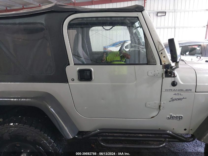 2000 Jeep Wrangler Sport VIN: 1J4FA49S4YP792704 Lot: 39592788