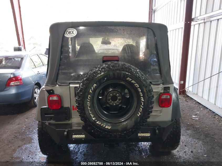2000 Jeep Wrangler Sport VIN: 1J4FA49S4YP792704 Lot: 39592788