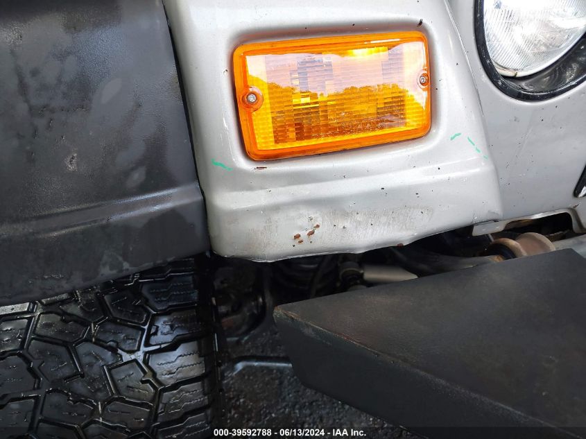 2000 Jeep Wrangler Sport VIN: 1J4FA49S4YP792704 Lot: 39592788