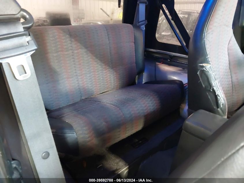 2000 Jeep Wrangler Sport VIN: 1J4FA49S4YP792704 Lot: 39592788