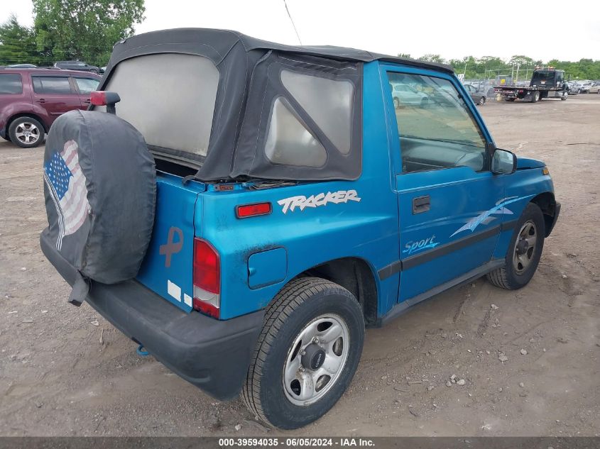 1997 Geo Tracker Softtop VIN: 2CNBE1866V6901909 Lot: 39594035