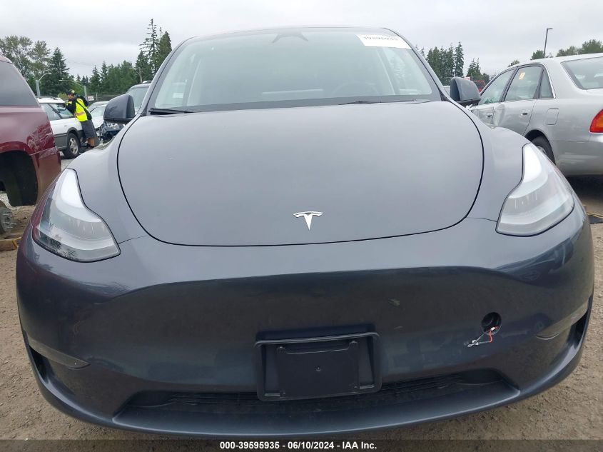 2023 Tesla Model Y Awd/Long Range Dual Motor All-Wheel Drive VIN: 7SAYGDEE9PF847897 Lot: 39595935