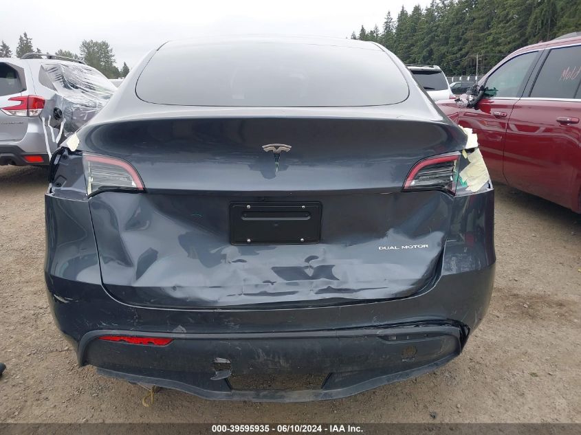 2023 Tesla Model Y Awd/Long Range Dual Motor All-Wheel Drive VIN: 7SAYGDEE9PF847897 Lot: 39595935