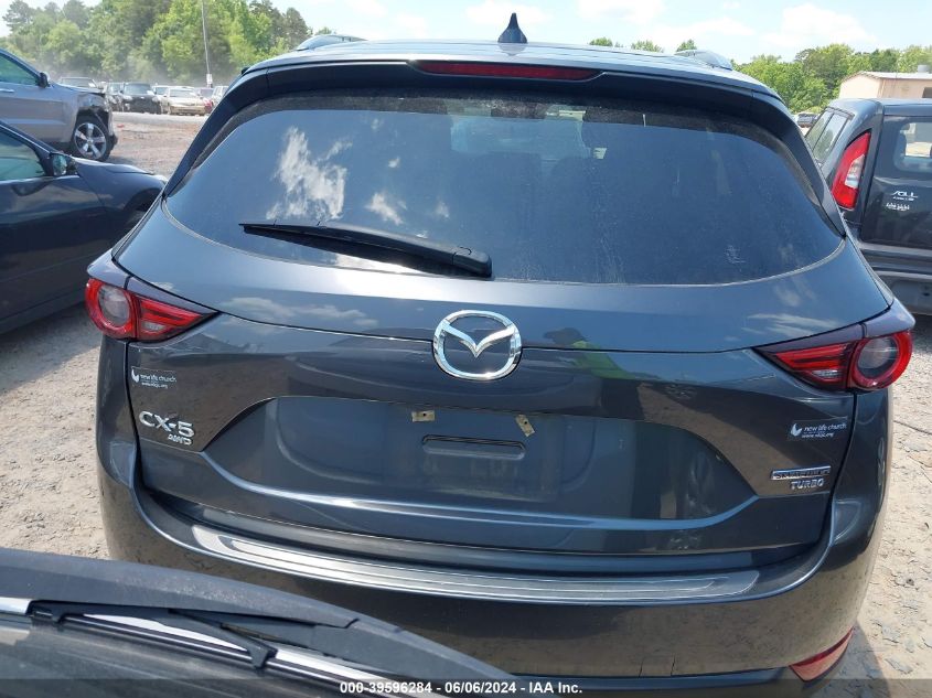 2021 Mazda Cx-5 Grand Touring Reserve VIN: JM3KFBAY1M0360902 Lot: 39596284