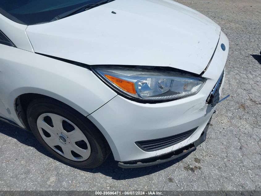 2015 Ford Focus S VIN: 1FADP3E28FL372465 Lot: 39596471