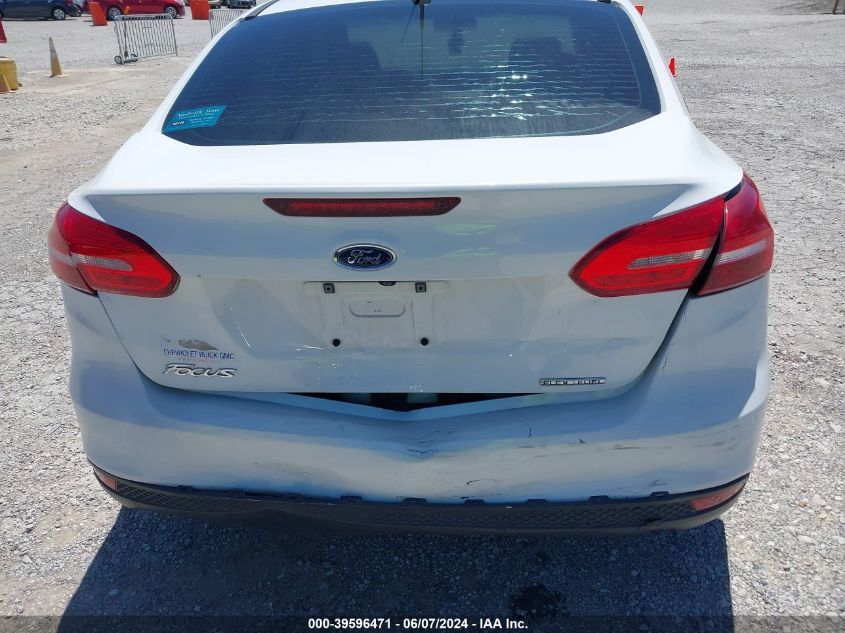 2015 Ford Focus S VIN: 1FADP3E28FL372465 Lot: 39596471