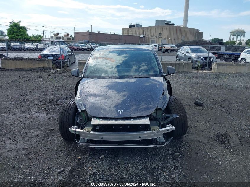 2024 Tesla Model Y Long Range Dual Motor All-Wheel Drive VIN: 7SAYGAEE8RF059937 Lot: 39597073