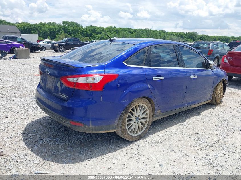 2014 Ford Focus Titanium VIN: 1FADP3J28EL233568 Lot: 39597698