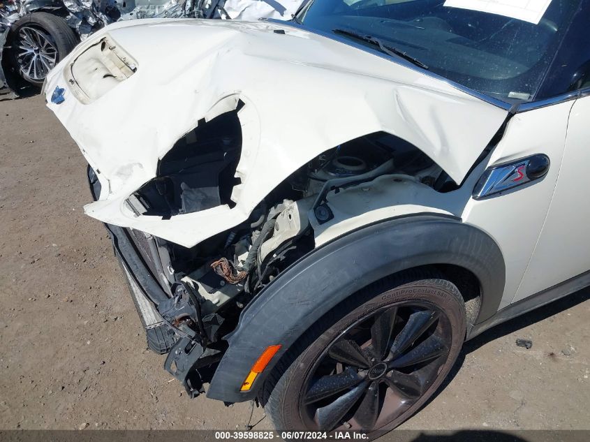 2009 Mini Cooper S VIN: WMWMS33509TY07695 Lot: 39598825