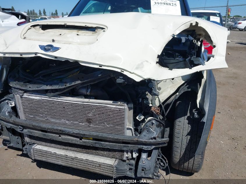 2009 Mini Cooper S VIN: WMWMS33509TY07695 Lot: 39598825