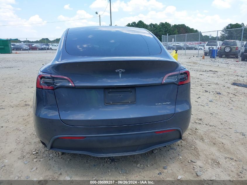 2023 Tesla Model Y Awd/Long Range Dual Motor All-Wheel Drive VIN: 7SAYGDEE0PA037877 Lot: 39599257