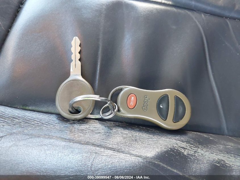 2001 Jeep Grand Cherokee Limited VIN: 1J4GW58N61C599443 Lot: 39599547