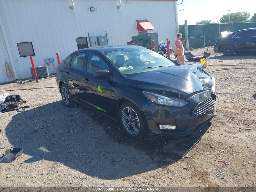 2018 Ford Focus Se VIN: 1FADP3FE0JL216955 Lot: 39599837