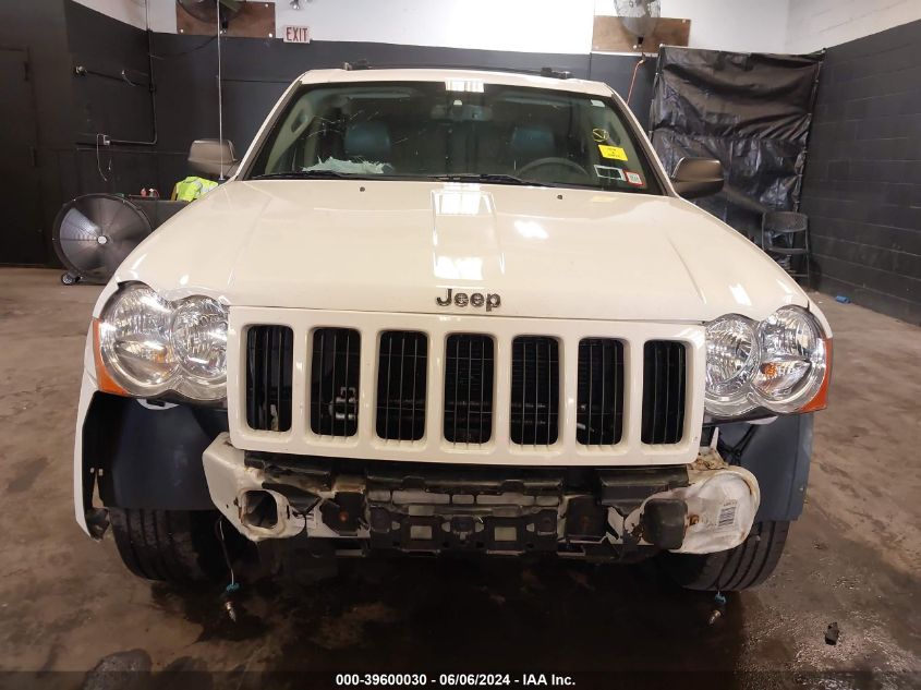 2009 Jeep Grand Cherokee Laredo VIN: 1J8GR48K69C514621 Lot: 39600030