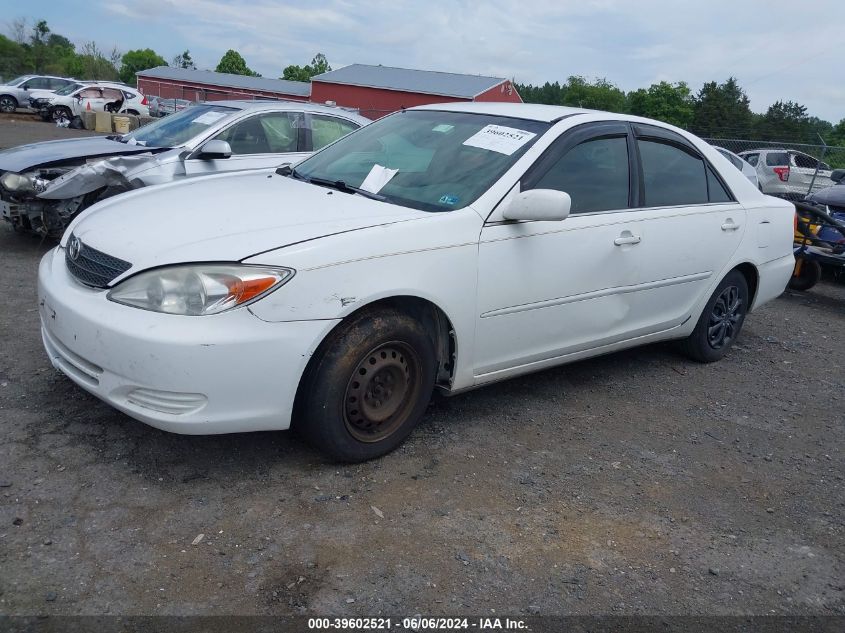 2002 Toyota Camry Le VIN: 4T1BE32K32U041983 Lot: 39602521