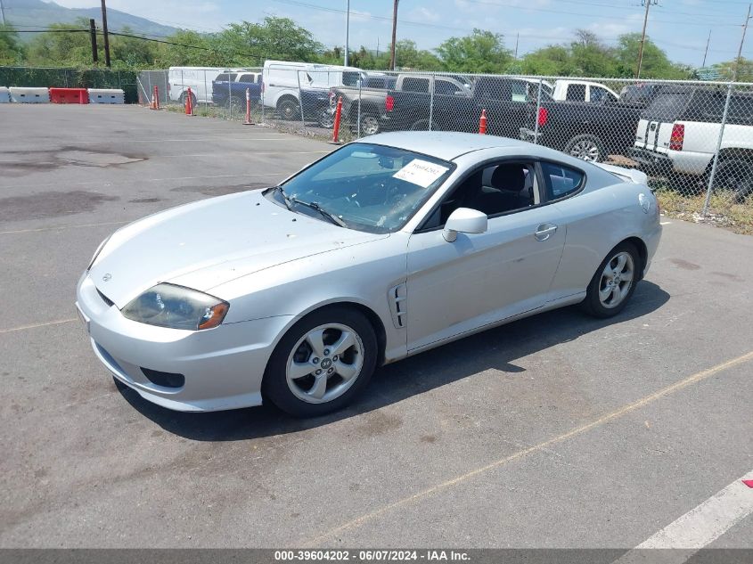 2005 Hyundai Tiburon Gs VIN: KMHHM65DX5U169847 Lot: 39604202