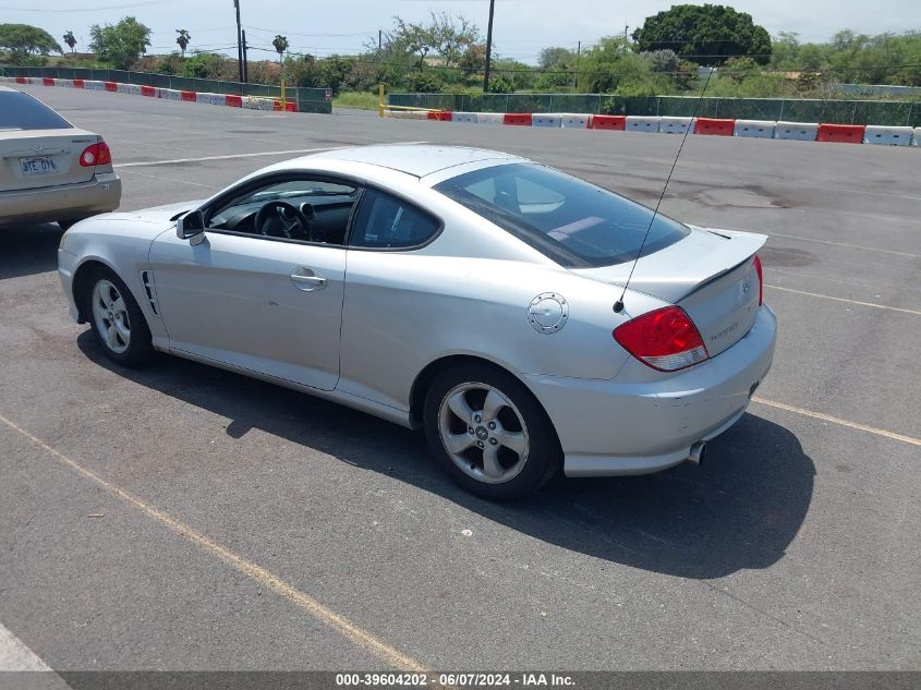 2005 Hyundai Tiburon Gs VIN: KMHHM65DX5U169847 Lot: 39604202