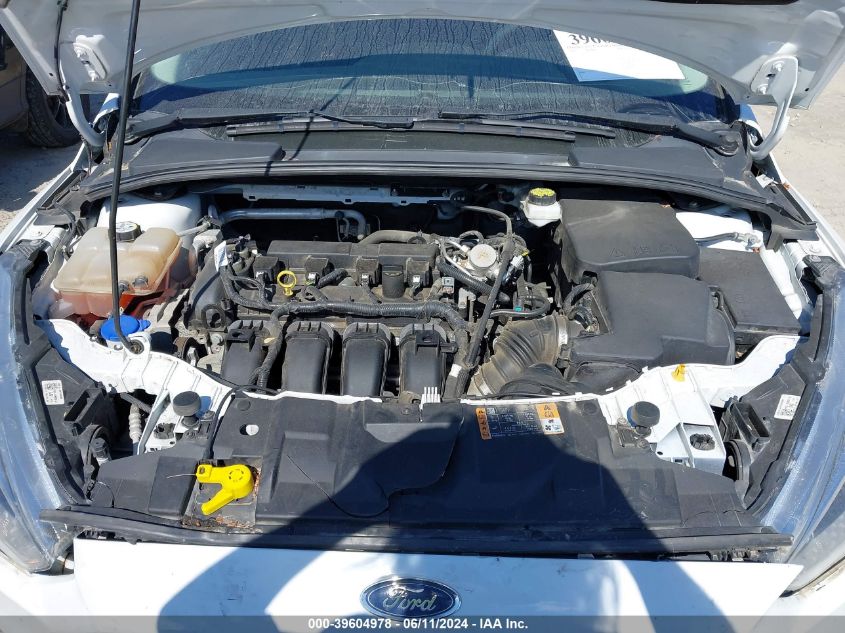 2018 Ford Focus Se VIN: 1FADP3F21JL235424 Lot: 39604978