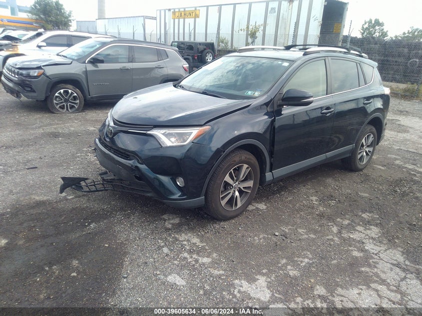 VIN JTMRFREV1JJ207300 2018 TOYOTA RAV4 XLE