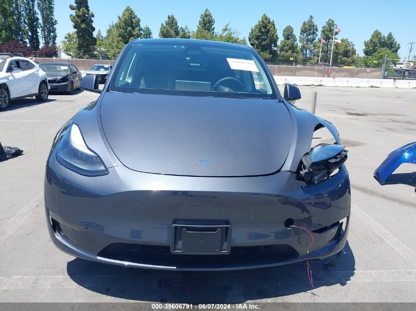 2023 Tesla Model Y Awd/Long Range Dual Motor All-Wheel Drive VIN: 7SAYGDEE6PF839420 Lot: 39606791