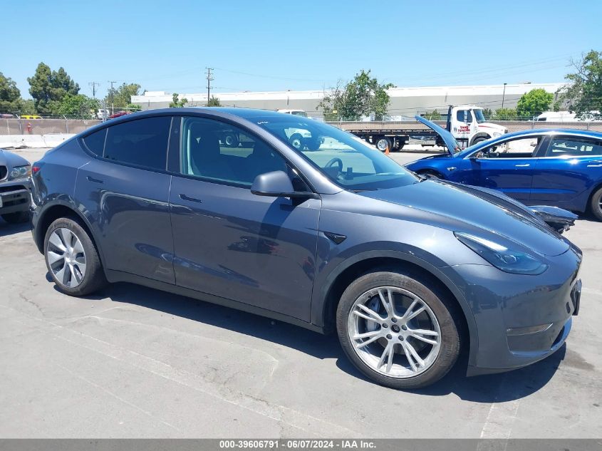 2023 Tesla Model Y Awd/Long Range Dual Motor All-Wheel Drive VIN: 7SAYGDEE6PF839420 Lot: 39606791