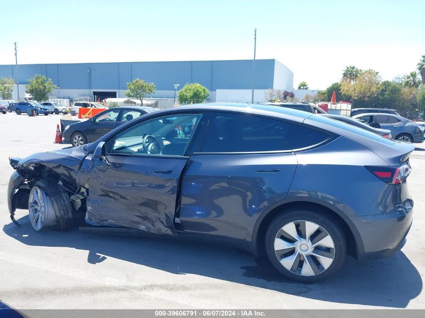 2023 Tesla Model Y Awd/Long Range Dual Motor All-Wheel Drive VIN: 7SAYGDEE6PF839420 Lot: 39606791