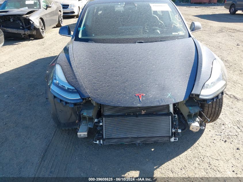 2018 Tesla Model 3 Long Range/Mid Range VIN: 5YJ3E1EA9JF004010 Lot: 39608625