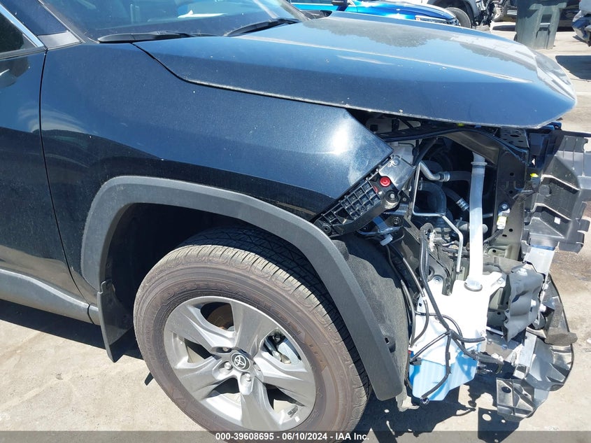 VIN 4T3RWRFV5PU100663 2023 TOYOTA RAV4 XLE HYBRID