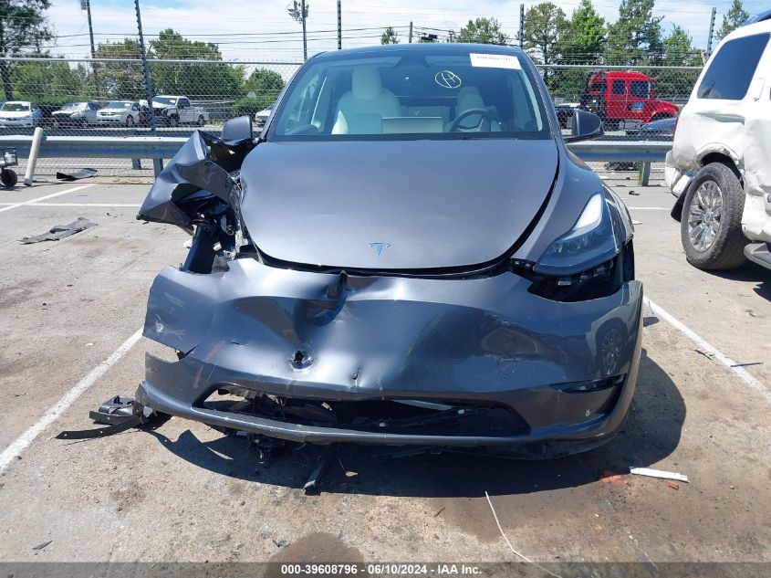 2023 Tesla Model Y Awd/Long Range Dual Motor All-Wheel Drive VIN: 7SAYGDEE9PF894329 Lot: 39608796