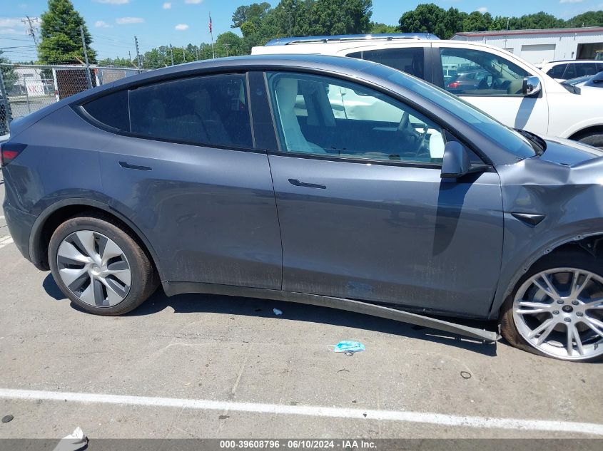 2023 Tesla Model Y Awd/Long Range Dual Motor All-Wheel Drive VIN: 7SAYGDEE9PF894329 Lot: 39608796