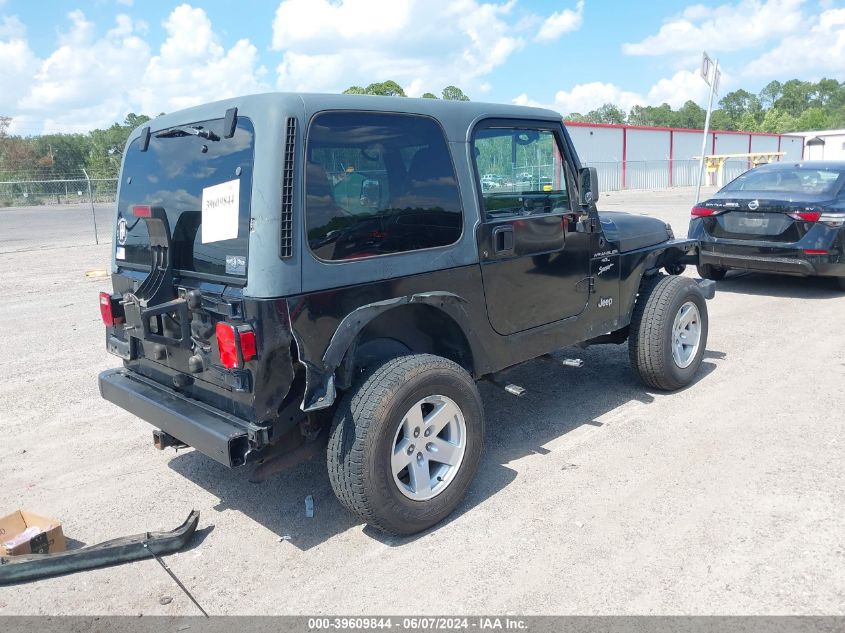 2000 Jeep Wrangler Sport VIN: 1J4FA49S2YP786013 Lot: 39609844