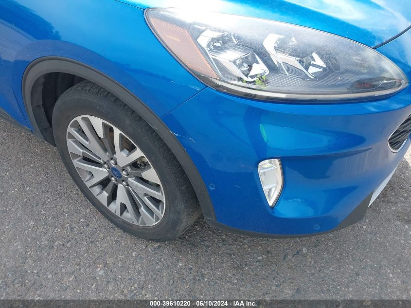 2021 Ford Escape Titanium VIN: 1FMCU9J91MUA70815 Lot: 39610220