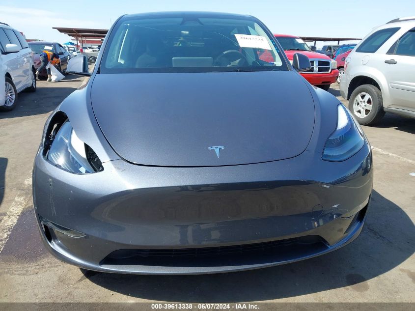 2023 Tesla Model Y VIN: 7SAYGDEE9PA183596 Lot: 39613338