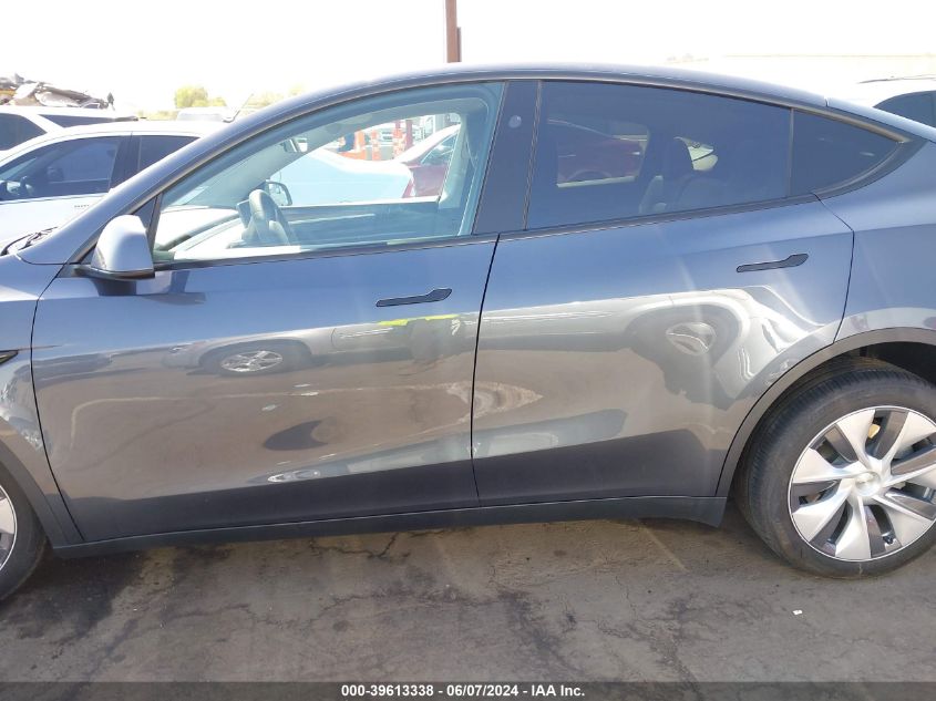 2023 Tesla Model Y VIN: 7SAYGDEE9PA183596 Lot: 39613338